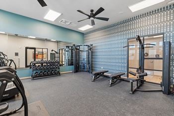 Fitness center with cable machines and weights